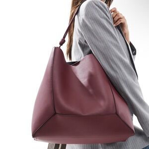 ASOS DESIGN paneled tote bag with knot handle in burgundy